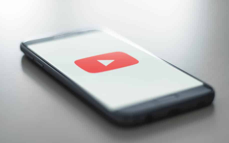 omline Video marketing-YouTube logo on phone