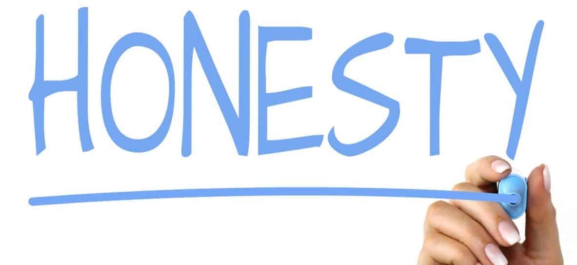 Pen writing the word Honesty (re copywriting)