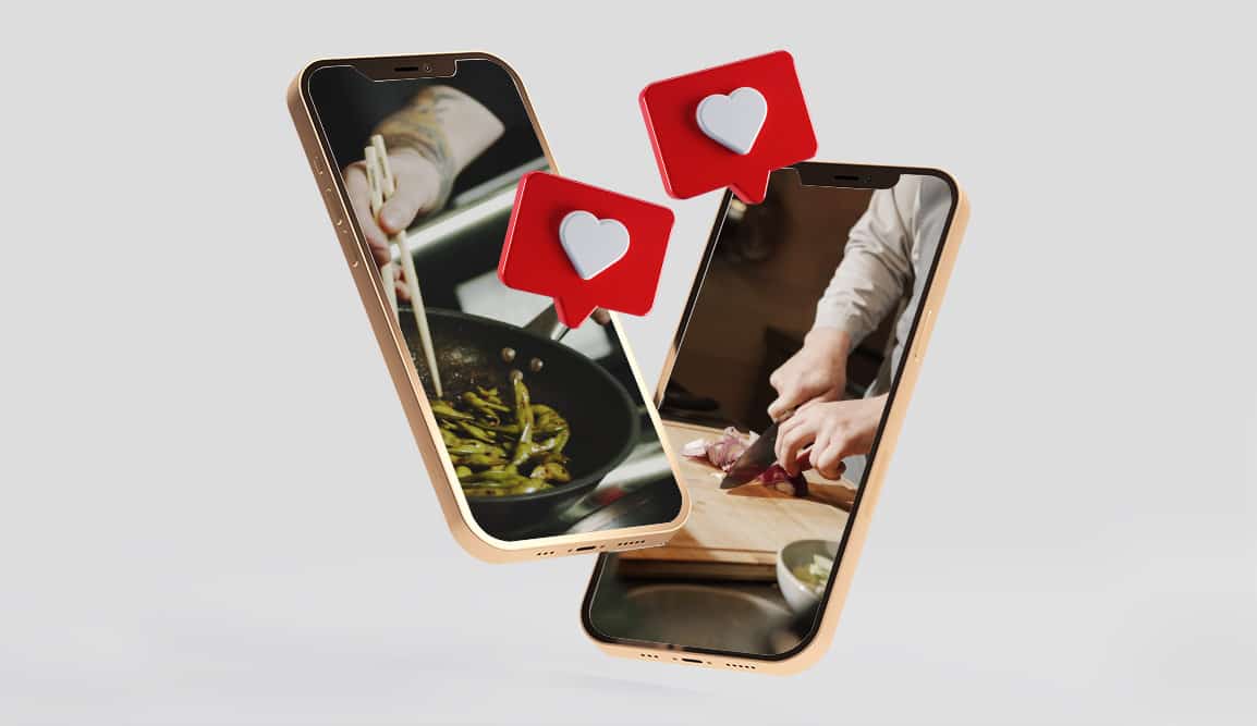 Two phones showing people cooking with small red hearts floating above to resemble Instagram 'likes'