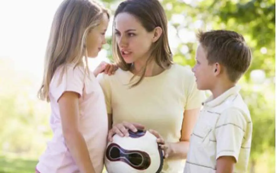 a woman and two children representing different demographics in market segmenation