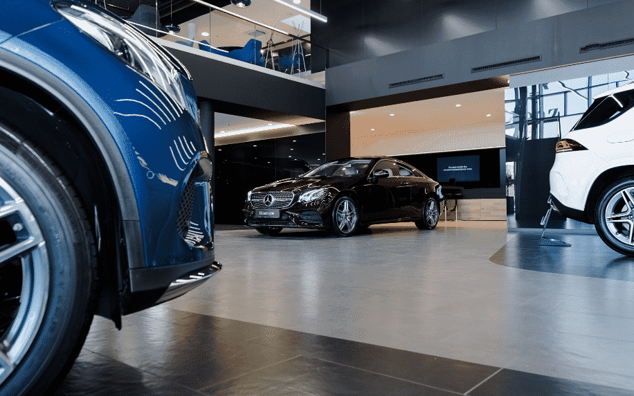 SEO for Car Dealerships: A Complete Guide 1 side of blue mini in car dealership