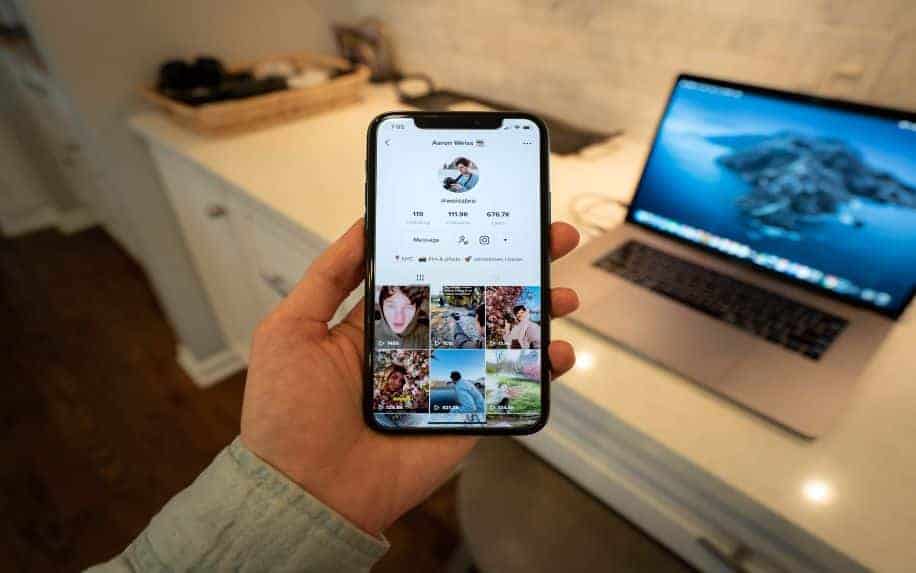 An influencer's profile on TikTok, shown on an iPhone