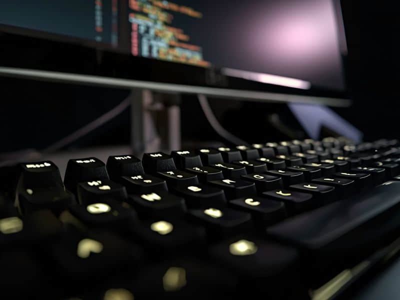 Lines of code on a screen representing the tag scripts managed through Google Tag Manager