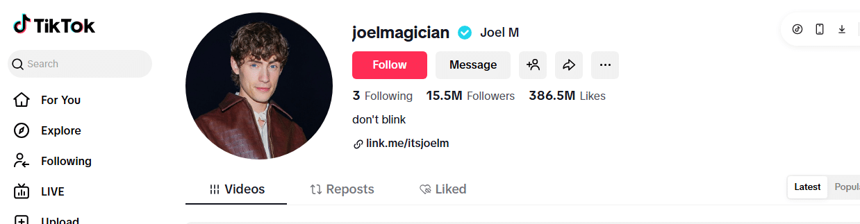 A TikTok profile page for joelmagician (Joel M), one of the most-followed on TikTok, with 15.5M followers and 386.5M likes. His profile picture shows a young man in a brown jacket, and his bio says don’t blink.