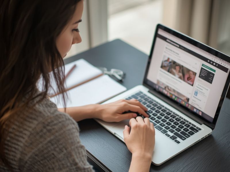 A content strategist planning SEO content aligned to customer personas at a laptop