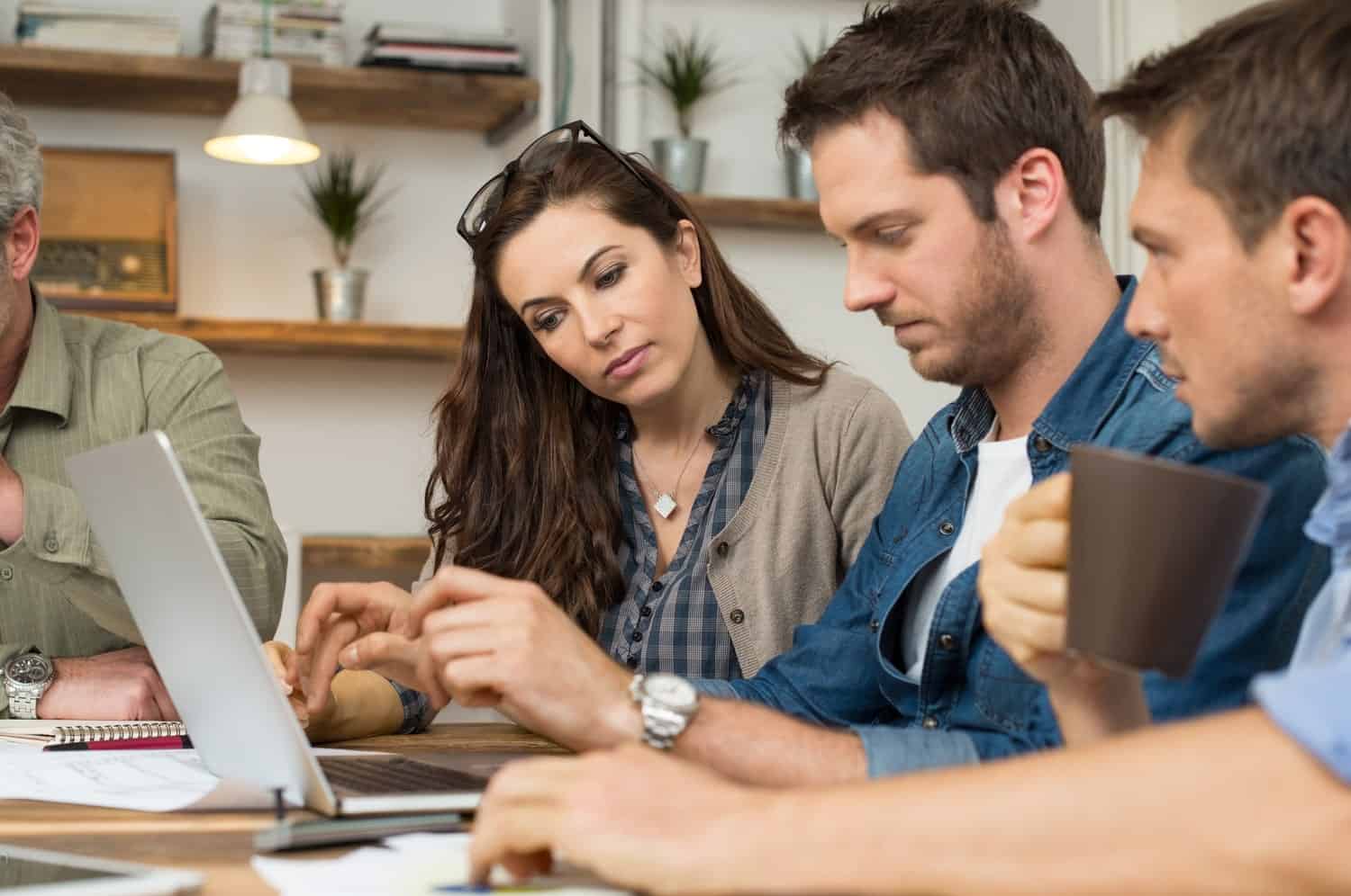 Colleagues checking their work is done