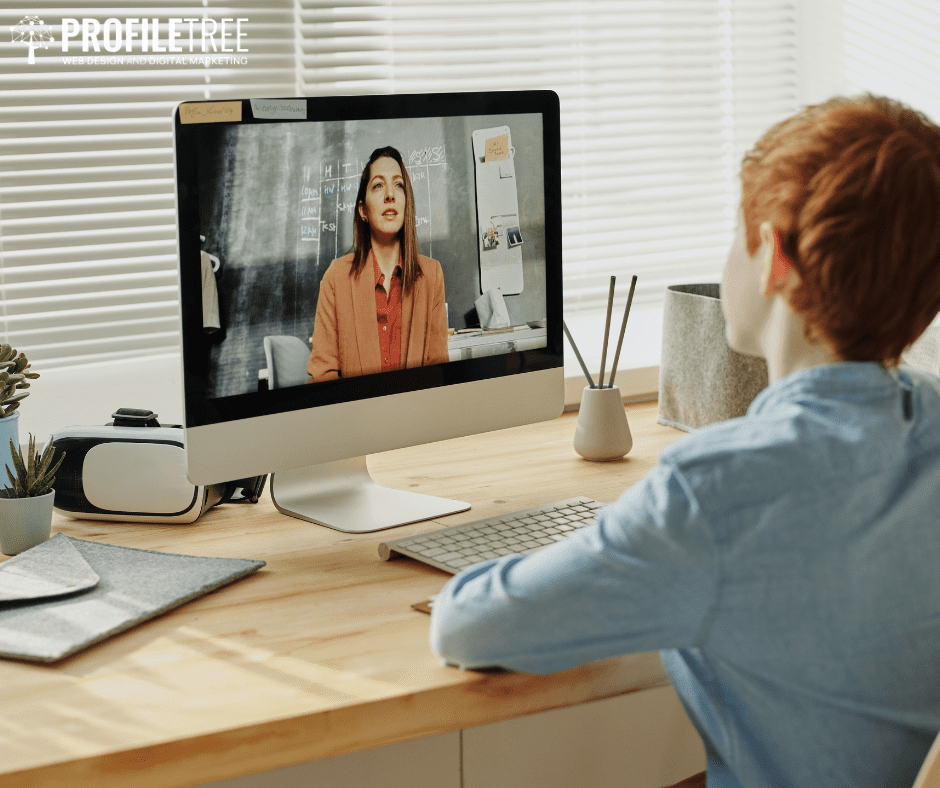 Online learning vs classroom learning - can online learning replace classroom learning? - an image of a young boy watching his teacher on a screen