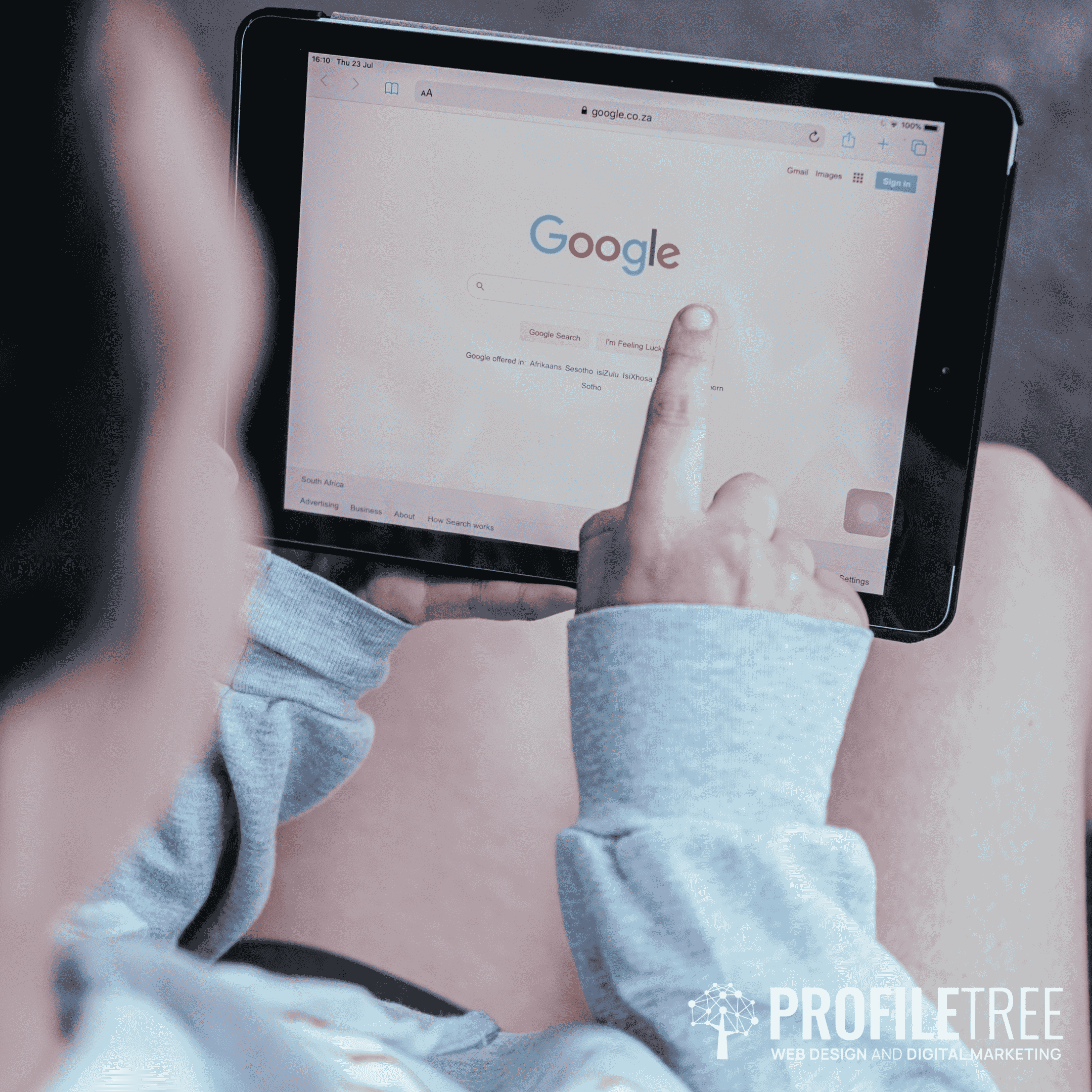 Image of someone on Google search engine page on iPad - your company needs a copywriter