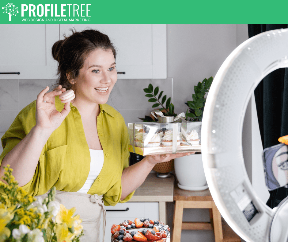 Food Influencers in Belfast - An influencer holding macaroons and showing off cake in front of the camera