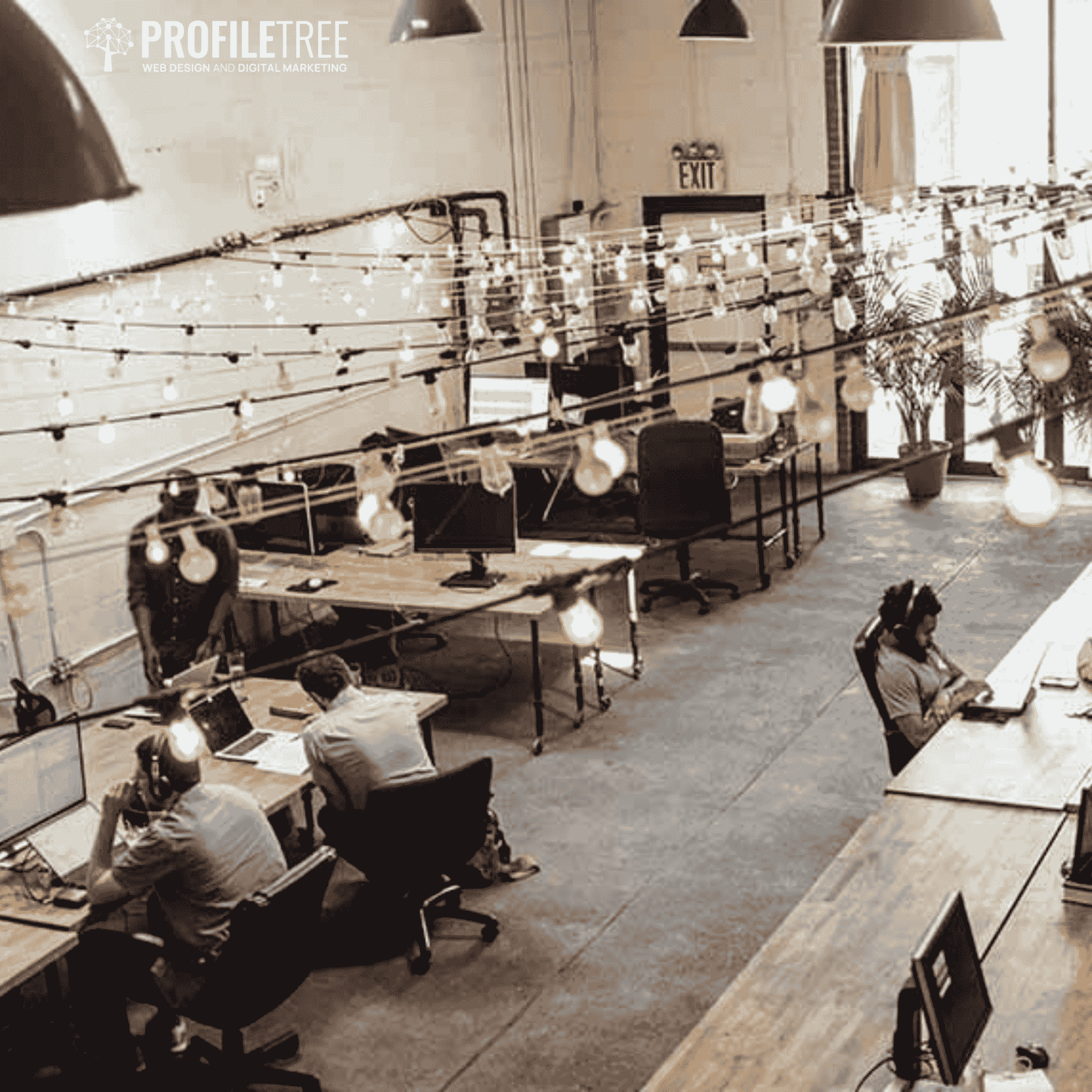People sitting in an office at computers