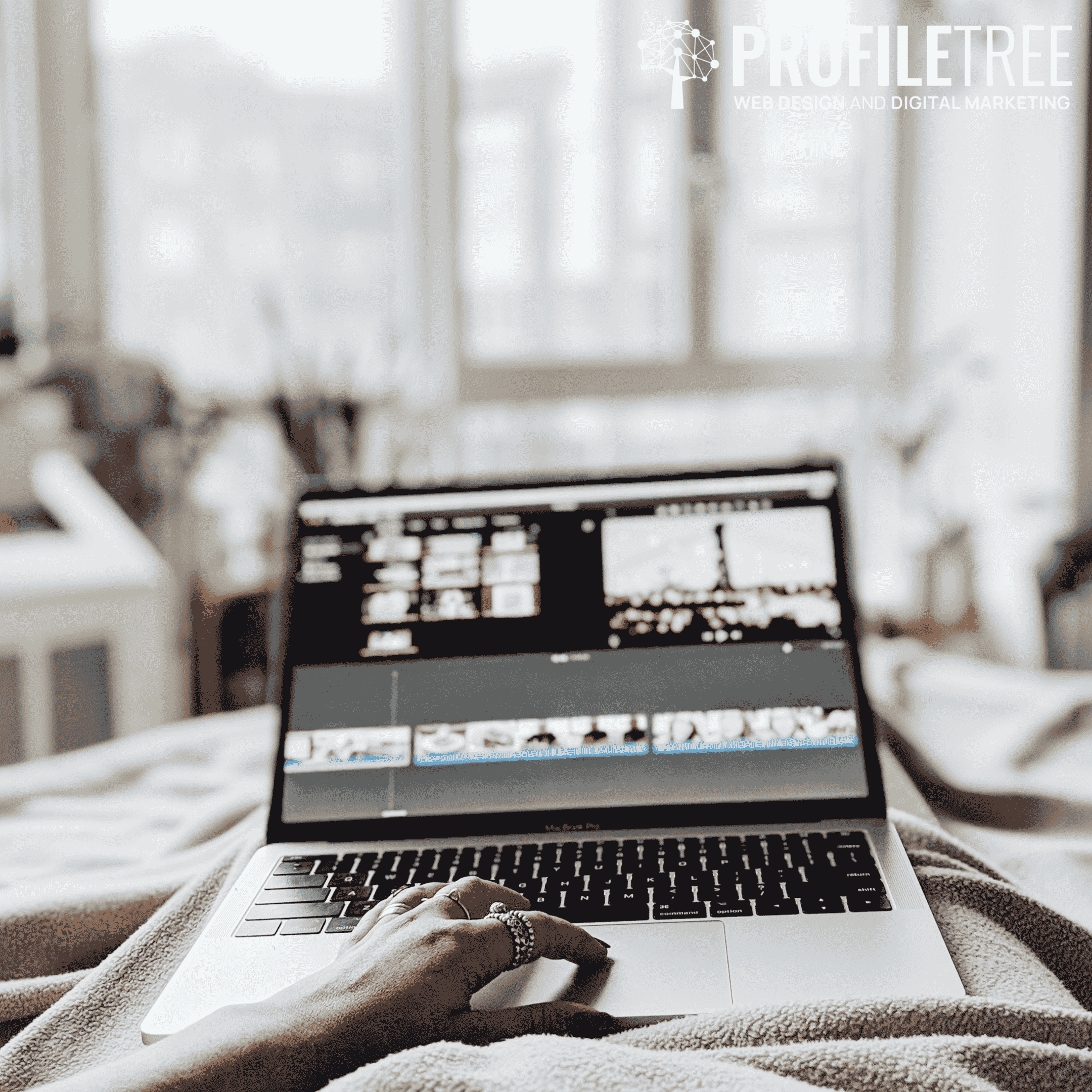 Image of someone editing a video on their laptop