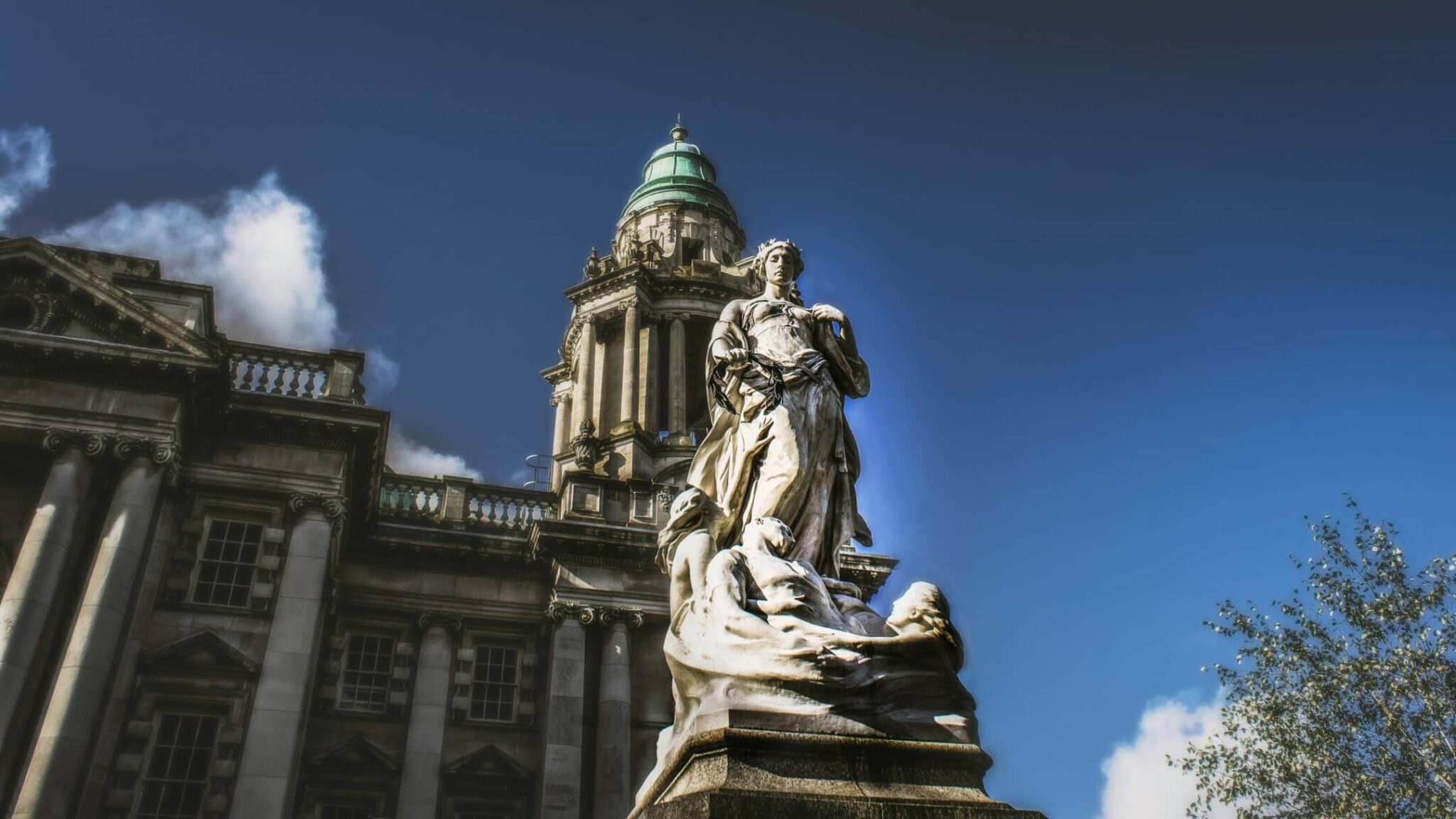 Personal and Professional Development in Northern Ireland: A Complete Guide to Business Growth in 2024. An image of the statue of a woman outside Belfast's city hall.