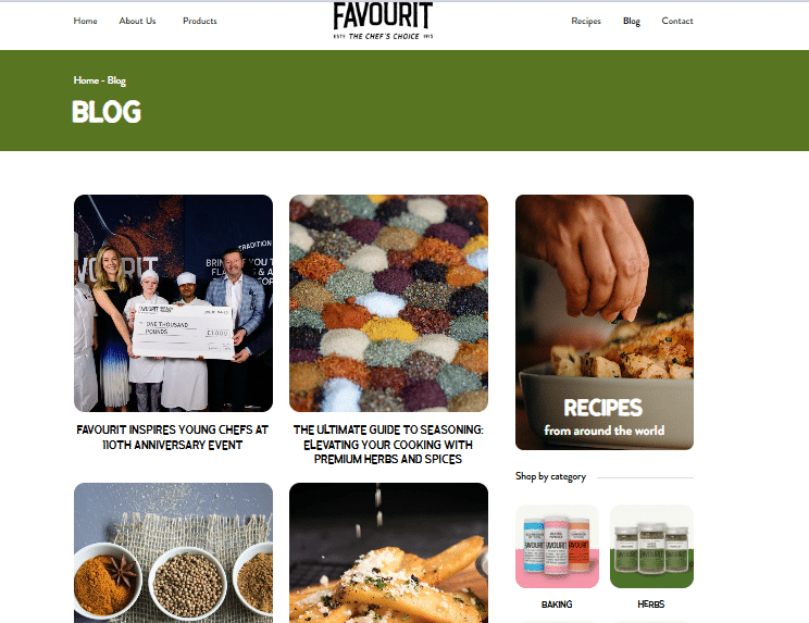 Screenshot of the Favourite blog page featuring a green banner, navigation menu, and images for articles about young chefs, herbs and spices, and world recipes—showcasing a heritage brand website design. Categories and product images appear on the right.
