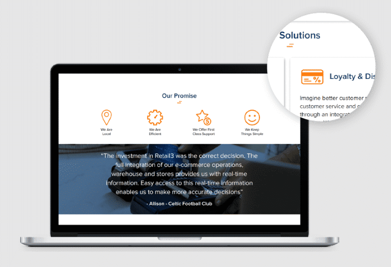 A laptop displays a webpage with icons and text under Our Promise, showcasing thoughtful web design. A magnified circular overlay highlights the Loyalty & Discount section on the webpage’s right-hand side. - Web Design for A Cloud-Based EPoS Provider - Threesoftware