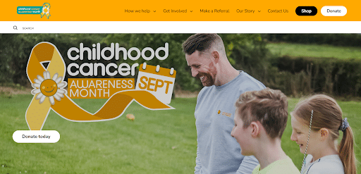 Charity Video Production: Cancer Fund for Children - A man and two children smile outside. Text reads childhood cancer awareness month SEPT with a gold ribbon. Buttons say Donate today, Shop, and Donate.